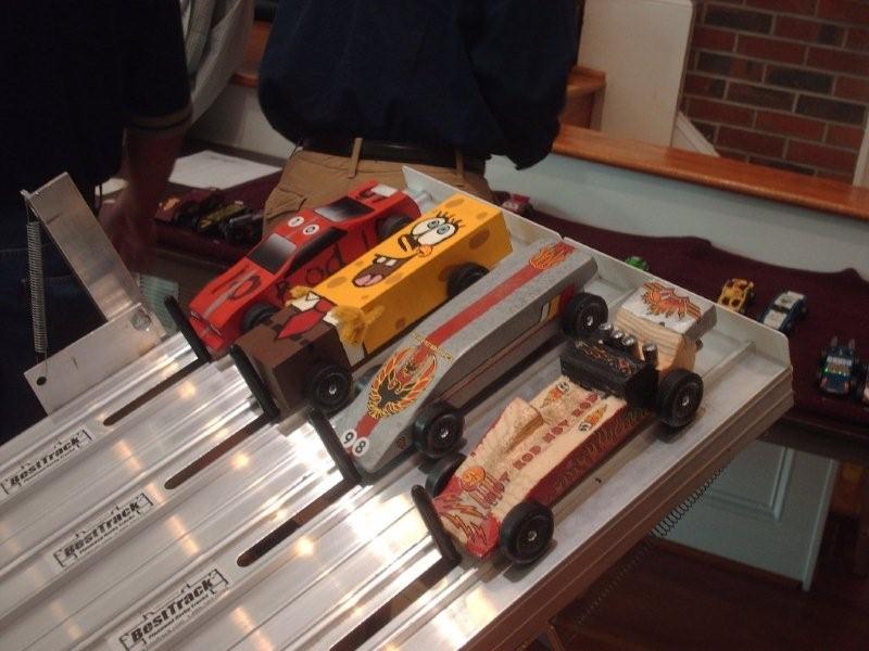 Pinewood derby racers at the start