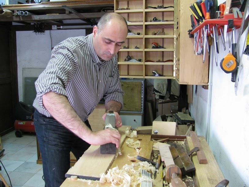 Guiliano in his shop